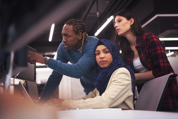diverse young professionals working in a tech hub in Munich or Hamburg